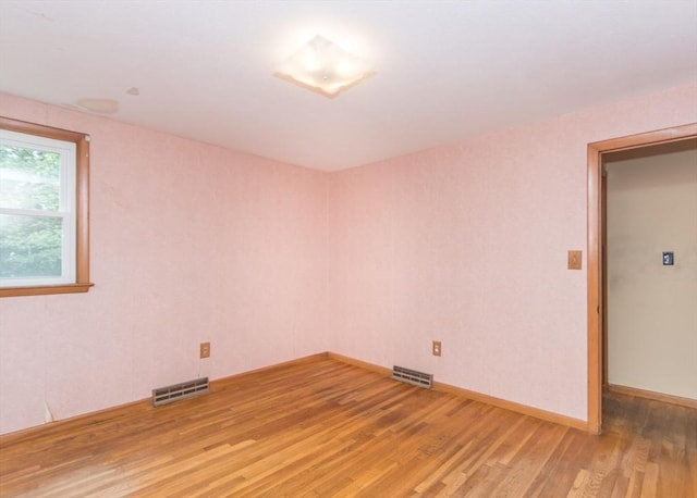 177 Pine Hill Cir, Waltham, MA 02451 - spare room featuring light wood finished floors and baseboards