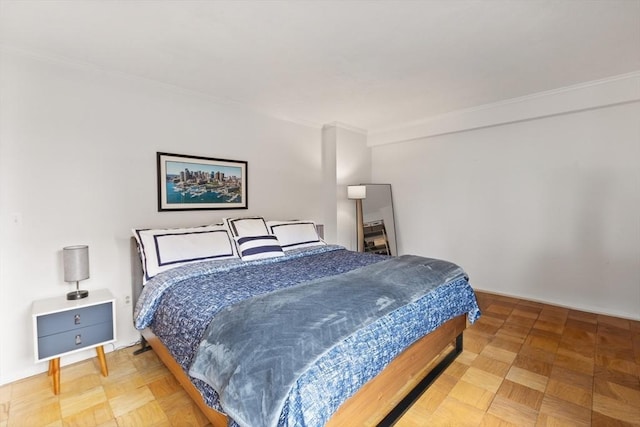 bedroom with crown molding