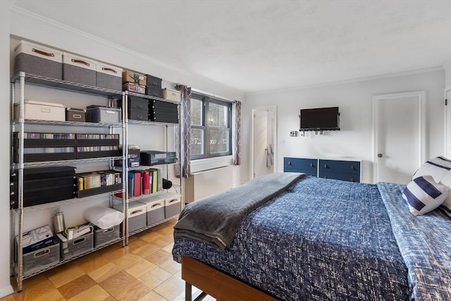 bedroom with ornamental molding