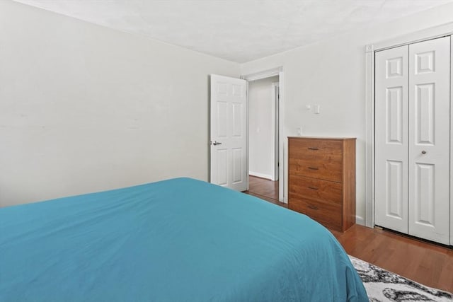 24 Highland Ave, Millbury, MA 01527 - bedroom with wood finished floors and a closet