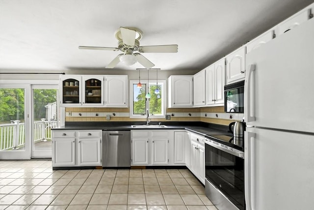24 Highland Ave, Millbury, MA 01527 - kitchen featuring freestanding refrigerator, stainless steel dishwasher, black microwave, electric range oven, and dark countertops