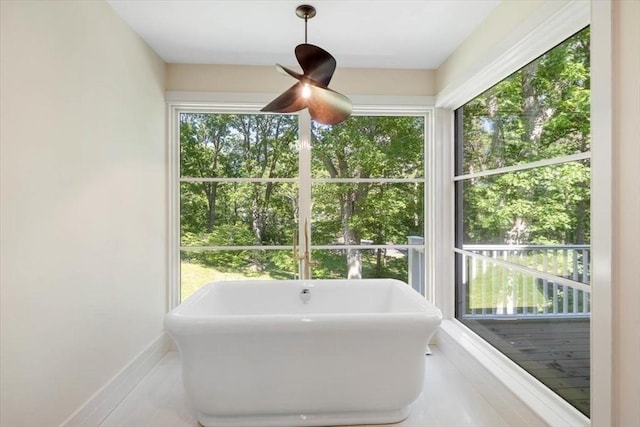 8 Evergreen Ln, Hingham, MA 02043 - full bathroom featuring a soaking tub, plenty of natural light, and baseboards