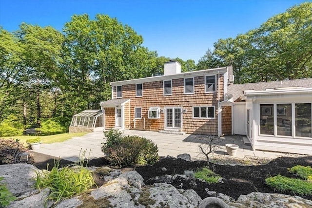 rear view of house featuring a patio area