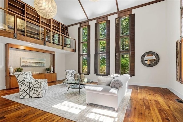 8 Evergreen Ln, Hingham, MA 02043 - sitting room featuring hardwood / wood-style flooring, baseboards, and a high ceiling