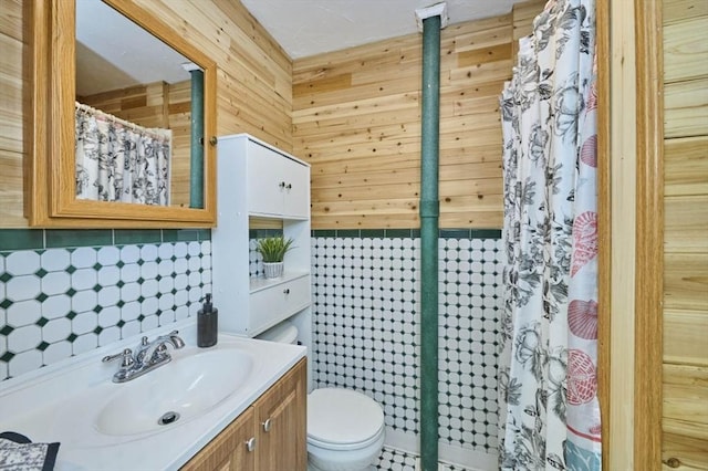 55 Friendship St, Billerica, MA 01821 - full bath with toilet, vanity, a shower with shower curtain, and wooden walls
