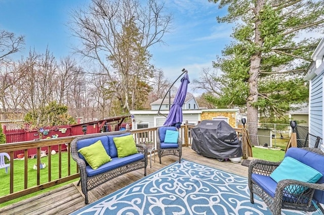 55 Friendship St, Billerica, MA 01821 - deck featuring fence, outdoor lounge area, a yard, and a grill