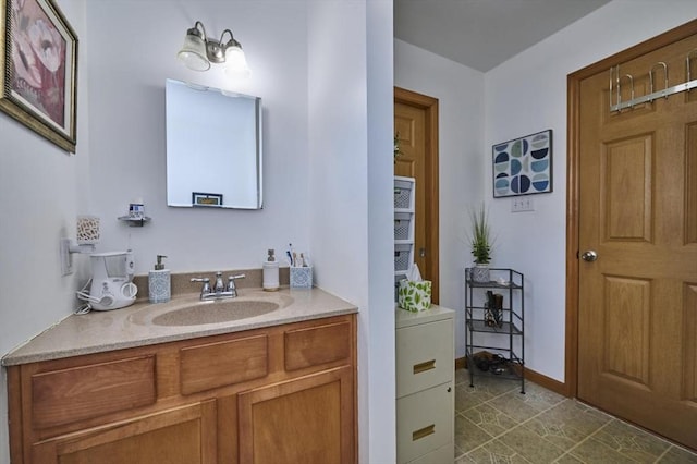 55 Friendship St, Billerica, MA 01821 - bathroom featuring baseboards and vanity