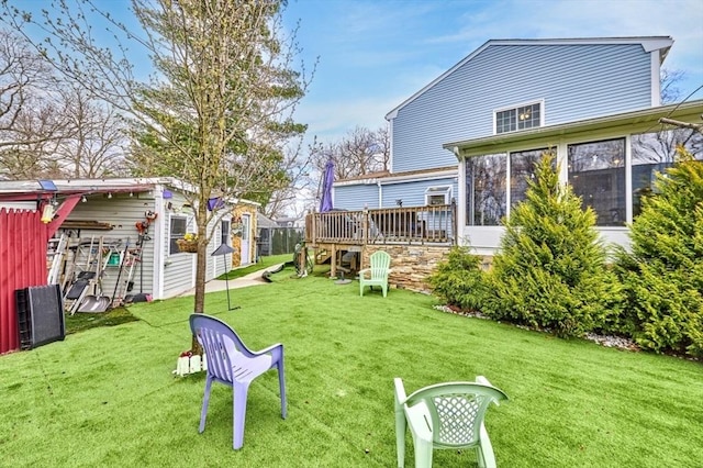 55 Friendship St, Billerica, MA 01821 - view of yard with a wooden deck, a sunroom, and an outbuilding
