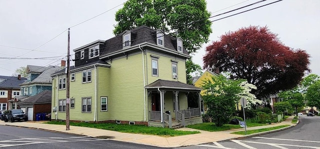 33 Franklin St, Chelsea, MA 02150 - view of front of property featuring a porch, mansard roof, and crawl space