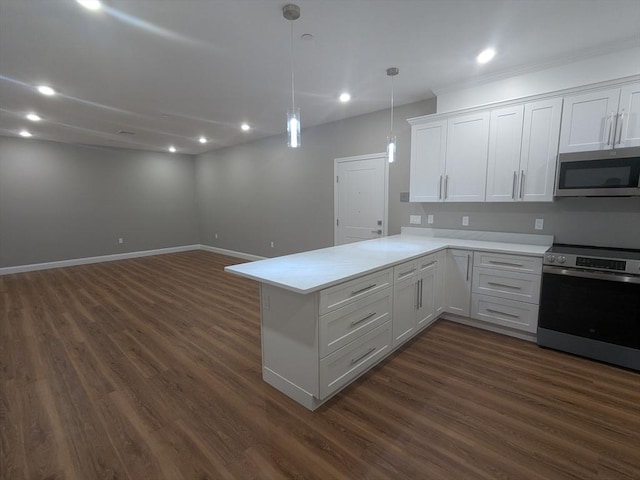 13 Nahant St Unit 2B, Lynn, MA 01902 - kitchen featuring appliances with stainless steel finishes, dark wood-style flooring, a peninsula, and recessed lighting