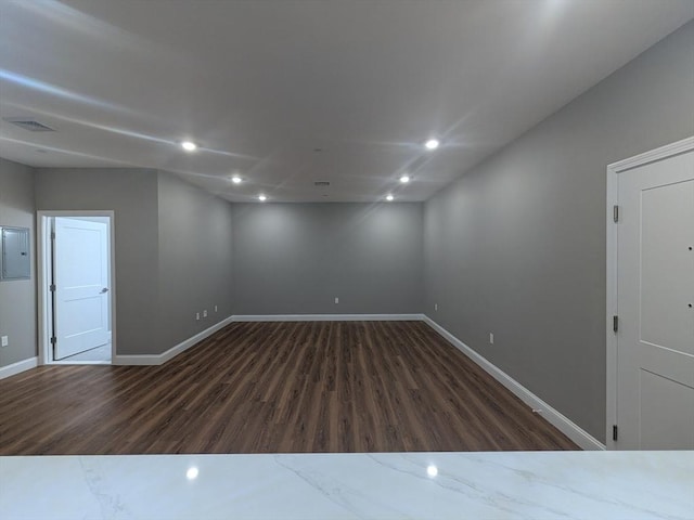 13 Nahant St Unit 2B, Lynn, MA 01902 - unfurnished room featuring dark wood-style flooring, baseboards, recessed lighting, and electric panel