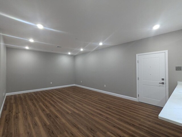 13 Nahant St Unit 2B, Lynn, MA 01902 - spare room featuring dark wood-style flooring, baseboards, and recessed lighting
