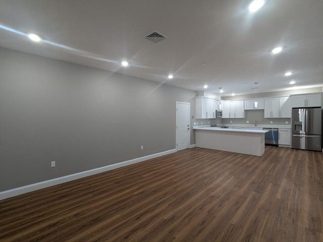 13 Nahant St Unit 2B, Lynn, MA 01902 - kitchen with stainless steel appliances, open floor plan, dark wood finished floors, baseboards, and recessed lighting