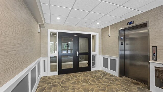 635 Old Post Rd Unit 204, Sharon, MA 02067 - property entrance with elevator and french doors