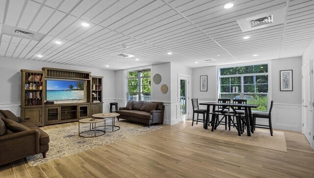 635 Old Post Rd Unit 204, Sharon, MA 02067 - living room featuring a decorative wall, a wainscoted wall, wood finished floors, and recessed lighting