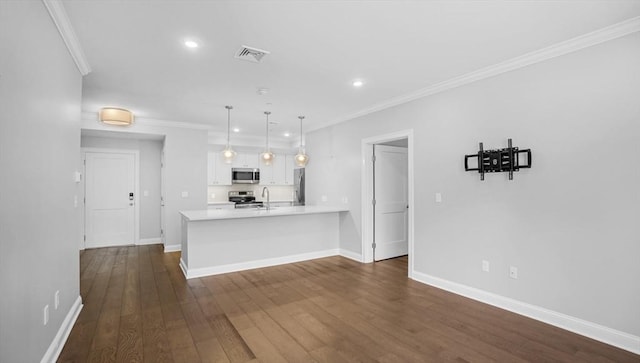 635 Old Post Rd Unit 204, Sharon, MA 02067 - kitchen with stainless steel appliances, white cabinets, light countertops, a peninsula, and recessed lighting