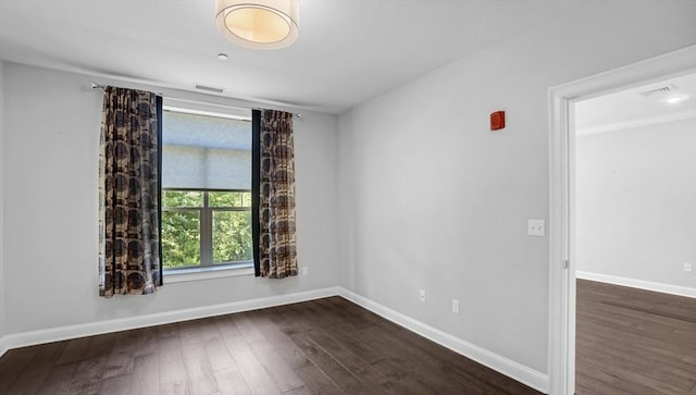 635 Old Post Rd Unit 204, Sharon, MA 02067 - empty room featuring dark wood-style flooring and crown molding