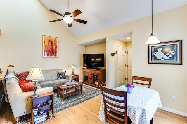 11 Alice Mullens Way Unit 11, Plymouth, MA 02360 - living room featuring wood finished floors, a ceiling fan, baseboards, and high vaulted ceiling