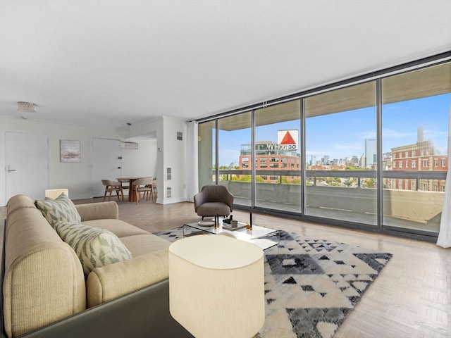 living room with floor to ceiling windows and parquet floors