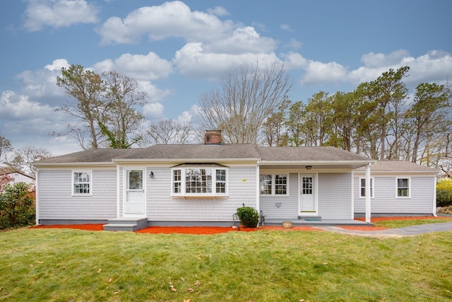 single story home with a front yard