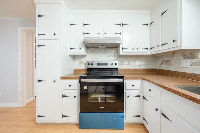 kitchen with white cabinets, electric range, light hardwood / wood-style floors, and extractor fan