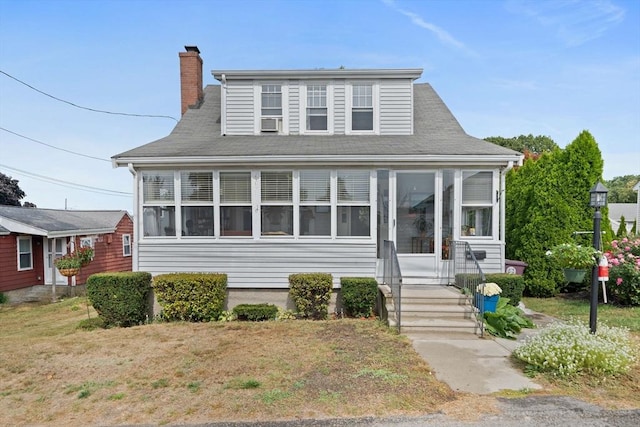 20 Harlem Rd, Weymouth, MA 02191 - bungalow featuring a chimney, a sunroom, and entry steps