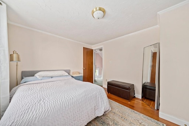 20 Harlem Rd, Weymouth, MA 02191 - bedroom with wood finished floors, baseboards, and ornamental molding