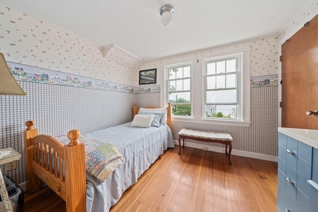 20 Harlem Rd, Weymouth, MA 02191 - bedroom with wallpapered walls, light wood-style flooring, baseboards, and crown molding