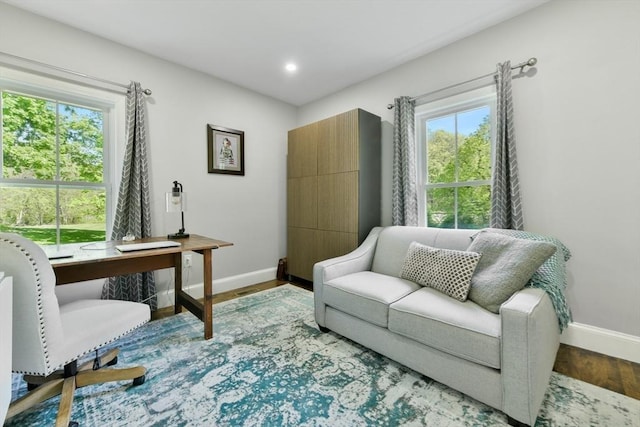 office area with recessed lighting, wood finished floors, and baseboards