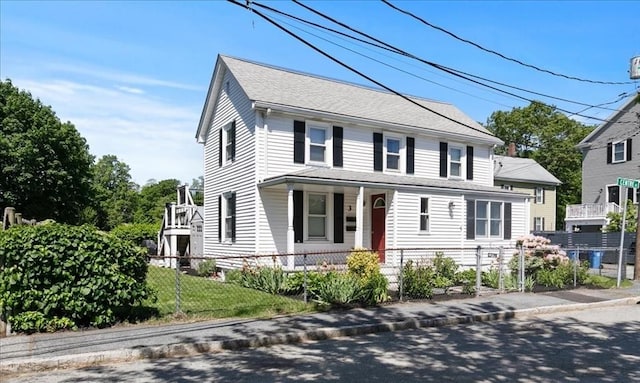 3 Centre St, Waltham, MA 02453 - view of front of house featuring covered porch and a fenced front yard