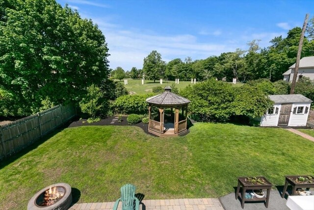 3 Centre St, Waltham, MA 02453 - view of yard featuring a gazebo, an outdoor fire pit, and an outbuilding