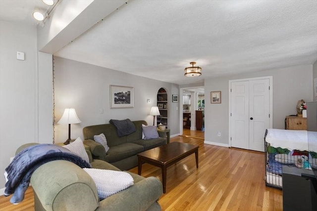 3 Centre St, Waltham, MA 02453 - living area with light wood-type flooring and baseboards