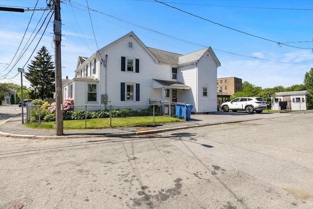 3 Centre St, Waltham, MA 02453 - view of front facade featuring a fenced front yard