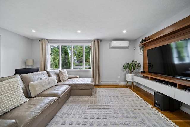 54 Forest St, Wilmington, MA 01887 - living area with a wall mounted AC, a baseboard radiator, wood finished floors, recessed lighting, and baseboards
