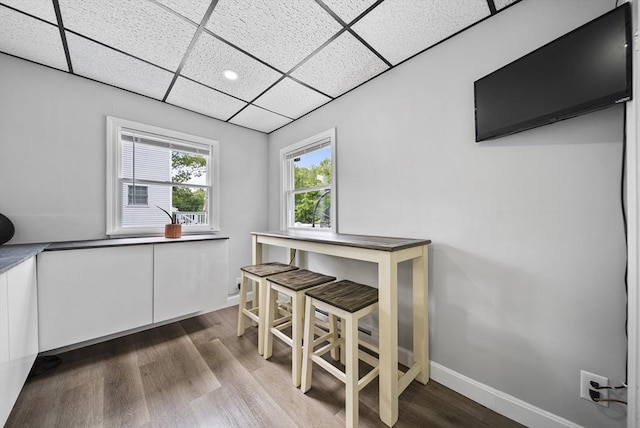 54 Forest St, Wilmington, MA 01887 - dining area featuring a drop ceiling, wood finished floors, baseboards, and recessed lighting
