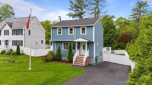 54 Forest St, Wilmington, MA 01887 - view of front of home featuring a chimney