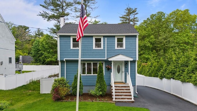 54 Forest St, Wilmington, MA 01887 - view of front facade with a chimney