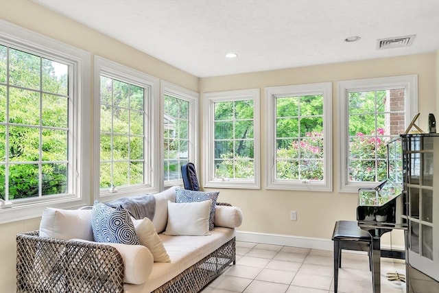 10 Ballard Ter, Lexington, MA 02420 - sunroom / solarium with healthy amount of natural light, baseboards, and tile patterned floors