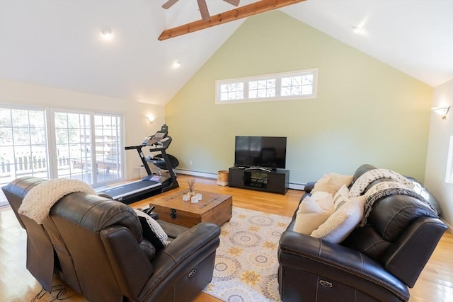 living area featuring ceiling fan, high vaulted ceiling, light wood-type flooring, and a baseboard radiator