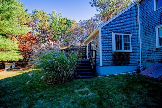 view of yard featuring a wooden deck