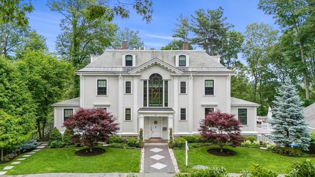 20 Birch Hill Rd, Newton, MA 02465 - second empire-style home featuring a chimney and a front yard