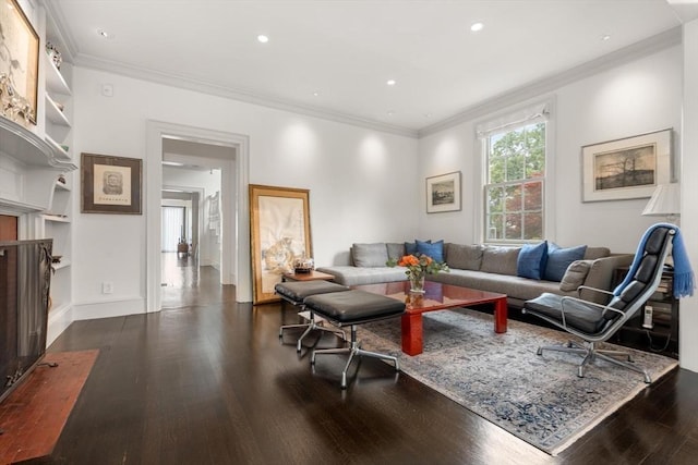 20 Birch Hill Rd, Newton, MA 02465 - living area with dark wood finished floors, ornamental molding, built in features, recessed lighting, and a fireplace with flush hearth