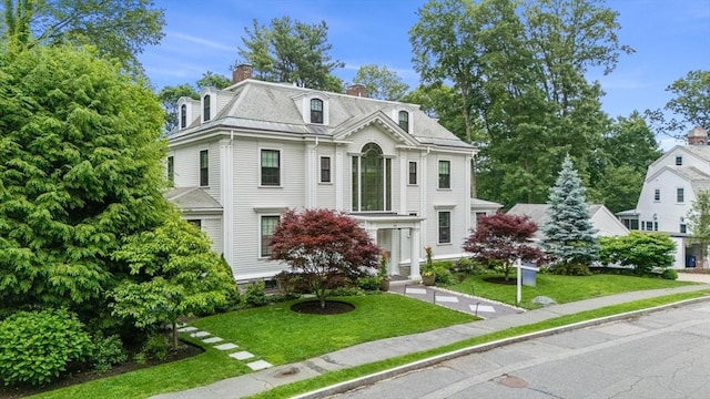 20 Birch Hill Rd, Newton, MA 02465 - victorian home with a chimney and a front lawn