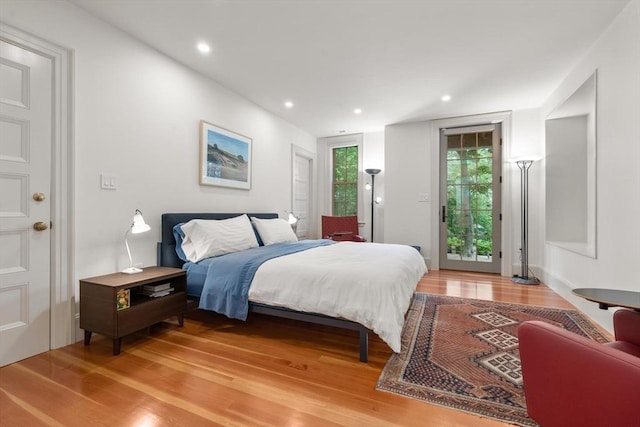 20 Birch Hill Rd, Newton, MA 02465 - bedroom featuring access to exterior, light wood-style floors, and recessed lighting