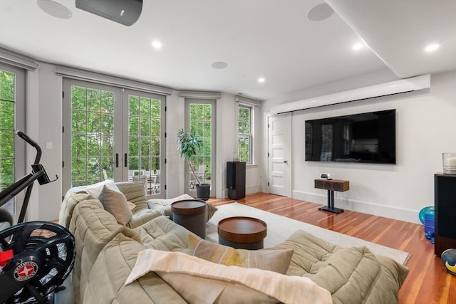 20 Birch Hill Rd, Newton, MA 02465 - living area featuring wood finished floors, french doors, plenty of natural light, and recessed lighting