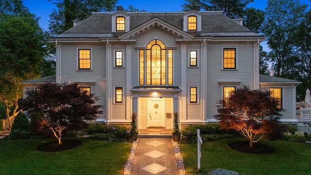 20 Birch Hill Rd, Newton, MA 02465 - view of front of house featuring a front yard and a shingled roof