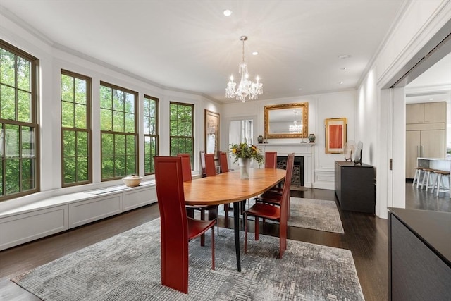 20 Birch Hill Rd, Newton, MA 02465 - dining room featuring crown molding, plenty of natural light, a chandelier, dark wood finished floors, and a fireplace