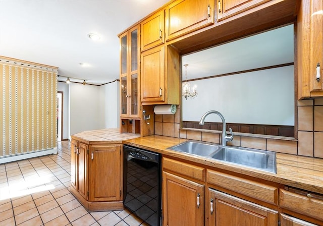 23 Shawmut Ave, Lowell, MA 01851 - kitchen featuring black dishwasher, a sink, light tile patterned floors, a chandelier, and brown cabinets
