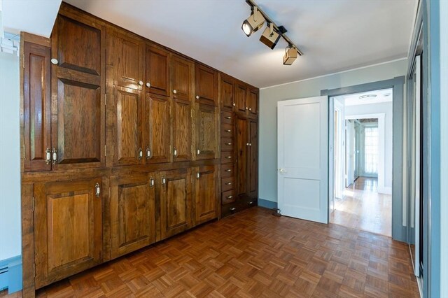 23 Shawmut Ave, Lowell, MA 01851 - interior space with baseboards and a baseboard radiator