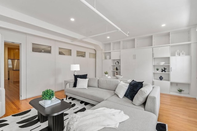 453 Washington St Unit 4A, Boston, MA 02111 - living room featuring light wood-style floors and recessed lighting